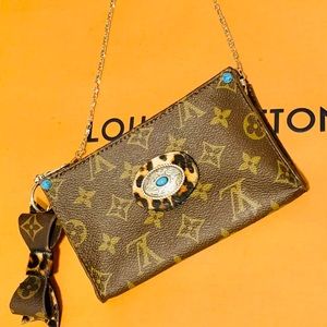 Authentic revamped Louis Vuitton pouch